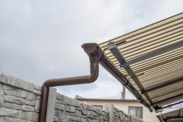 Plastic Downspout Installation in Granville